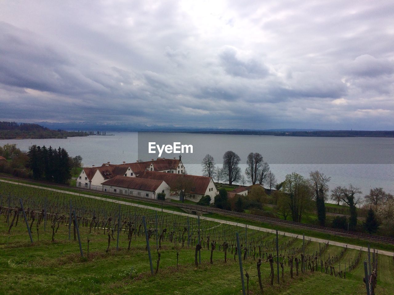 Scenic view of landscape against cloudy sky