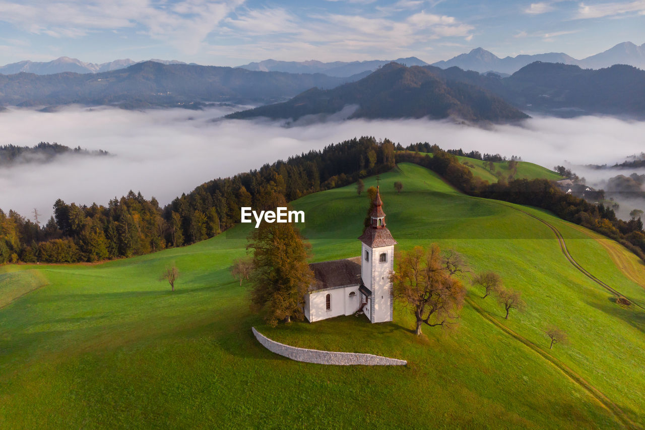 Scenic view of landscape and mountains against sky