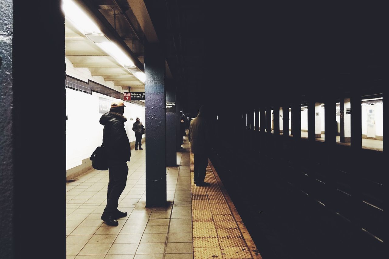 People waiting at subway station