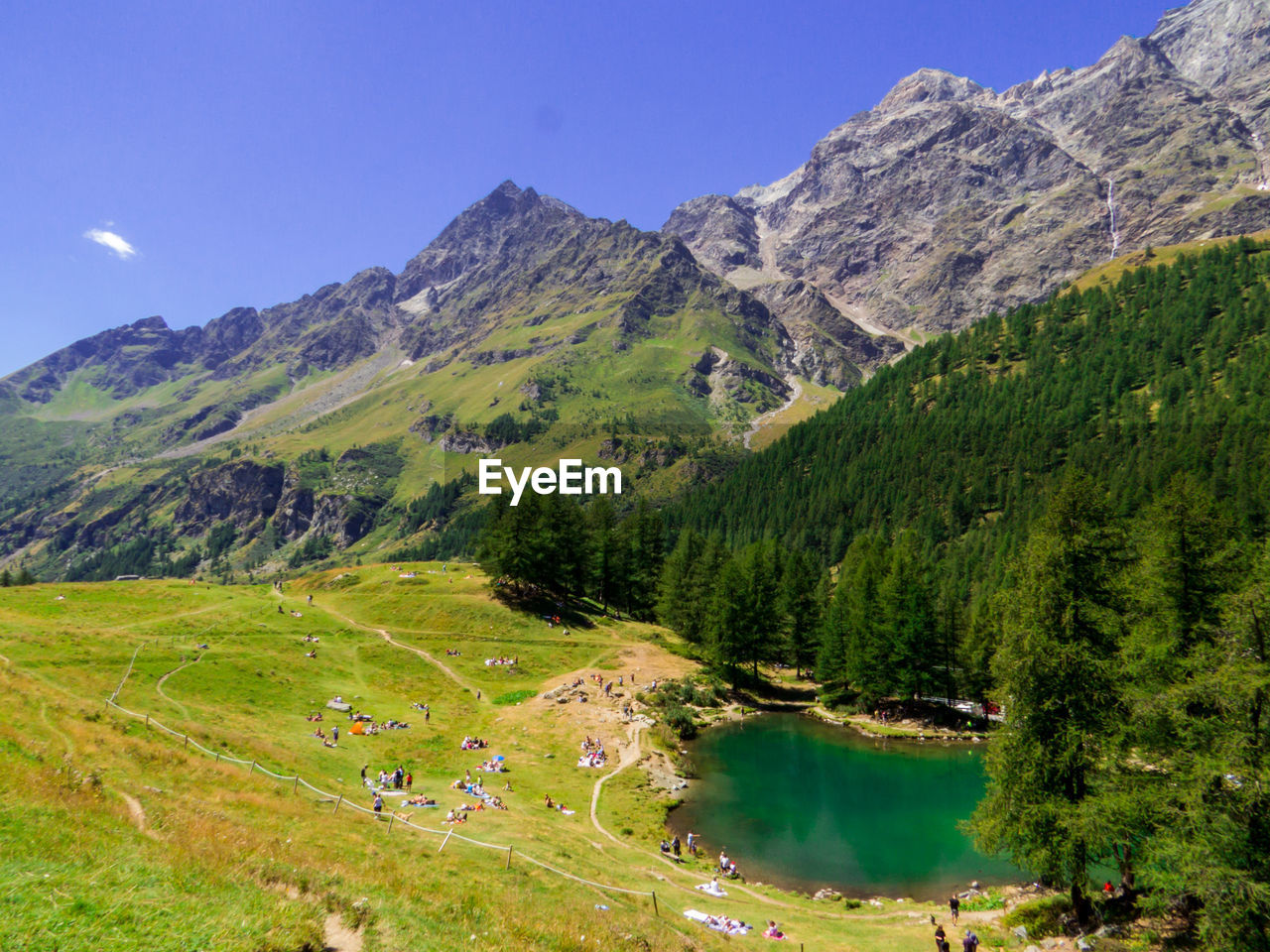 scenic view of landscape and mountains against sky