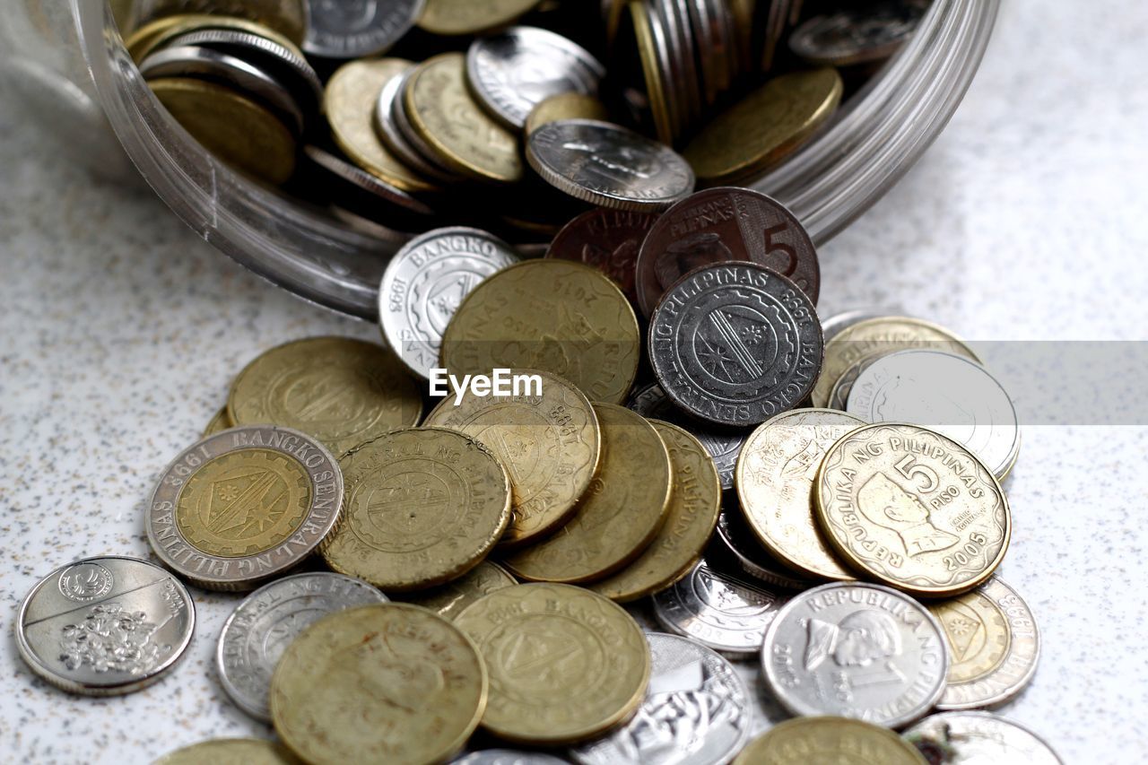 Close-up of coins on table