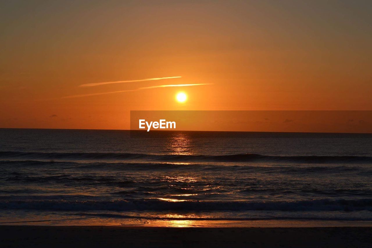 Scenic view of sea during sunset