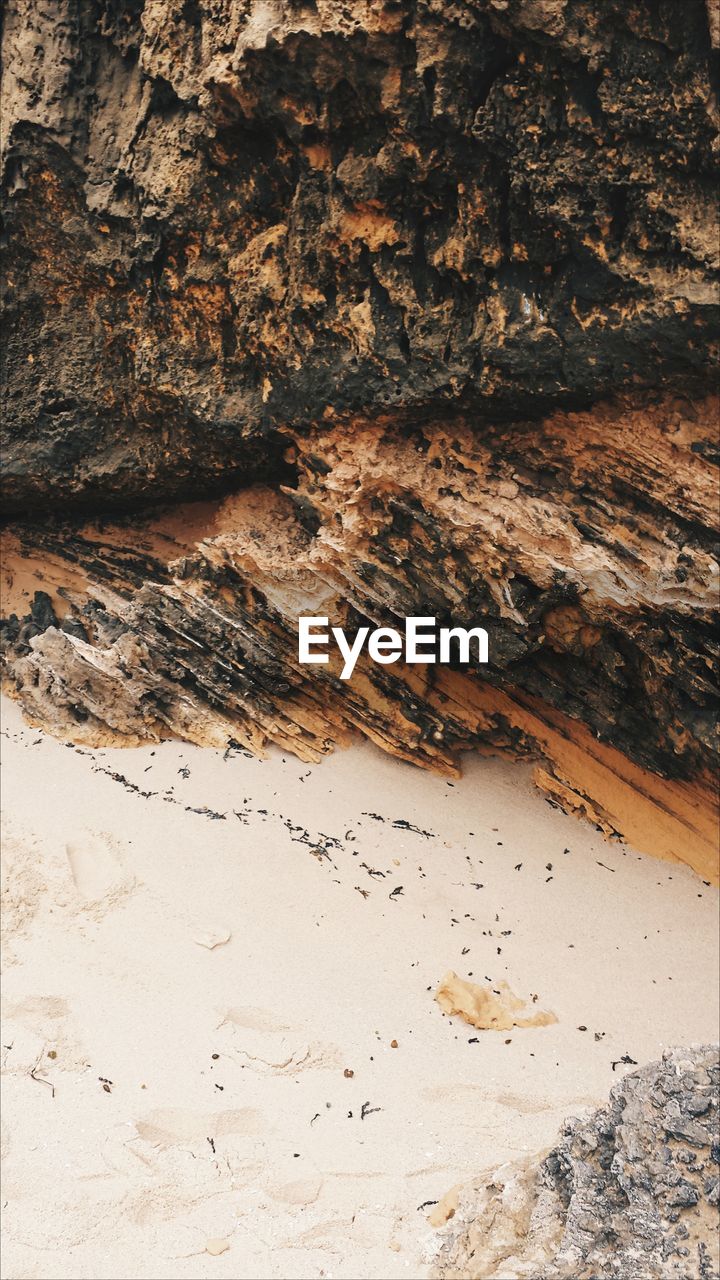 High angle view of rock formation at beach