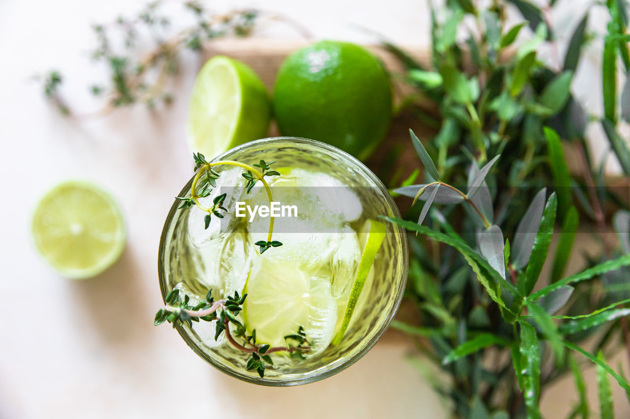 Refreshment infused water with lime and thyme. healthy drink and detox concept. summer beverage. 