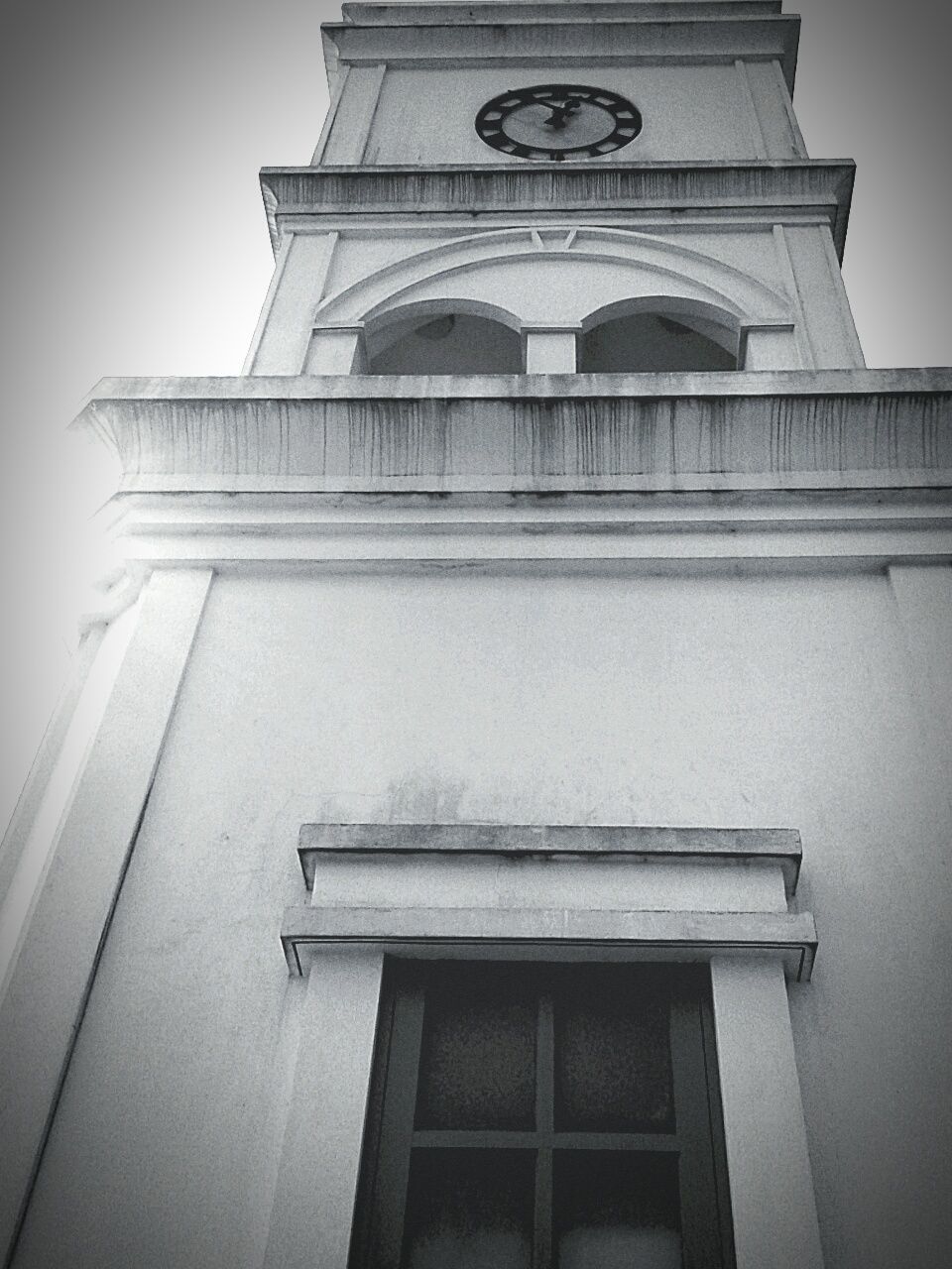 LOW ANGLE VIEW OF CLOCK TOWER AGAINST SKY