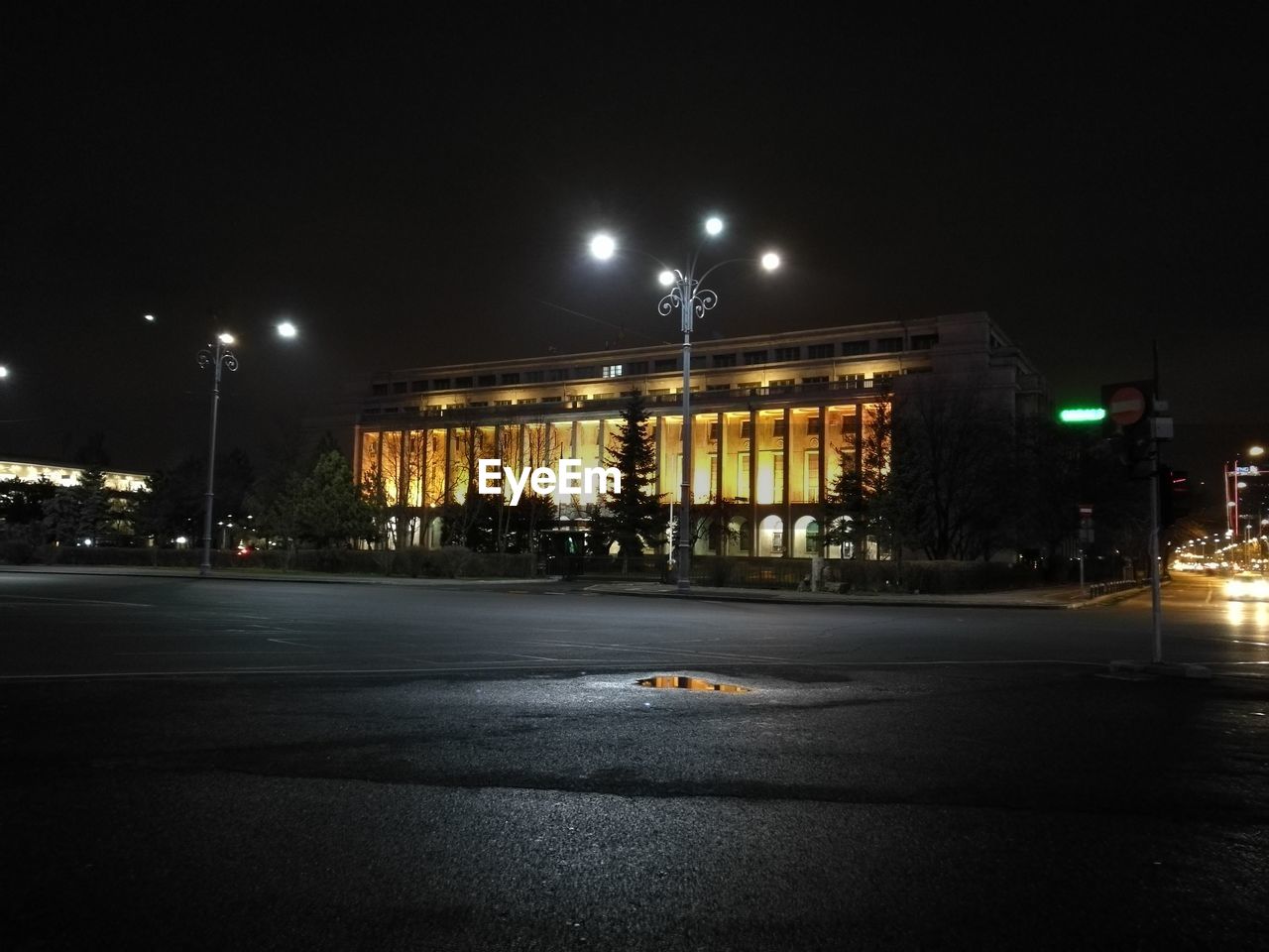 ILLUMINATED STREET AT NIGHT