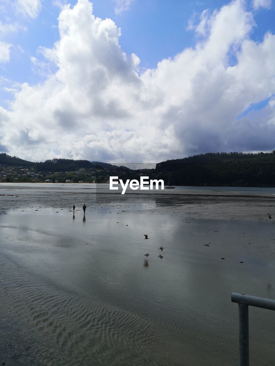 PANORAMIC VIEW OF BEACH AGAINST SKY