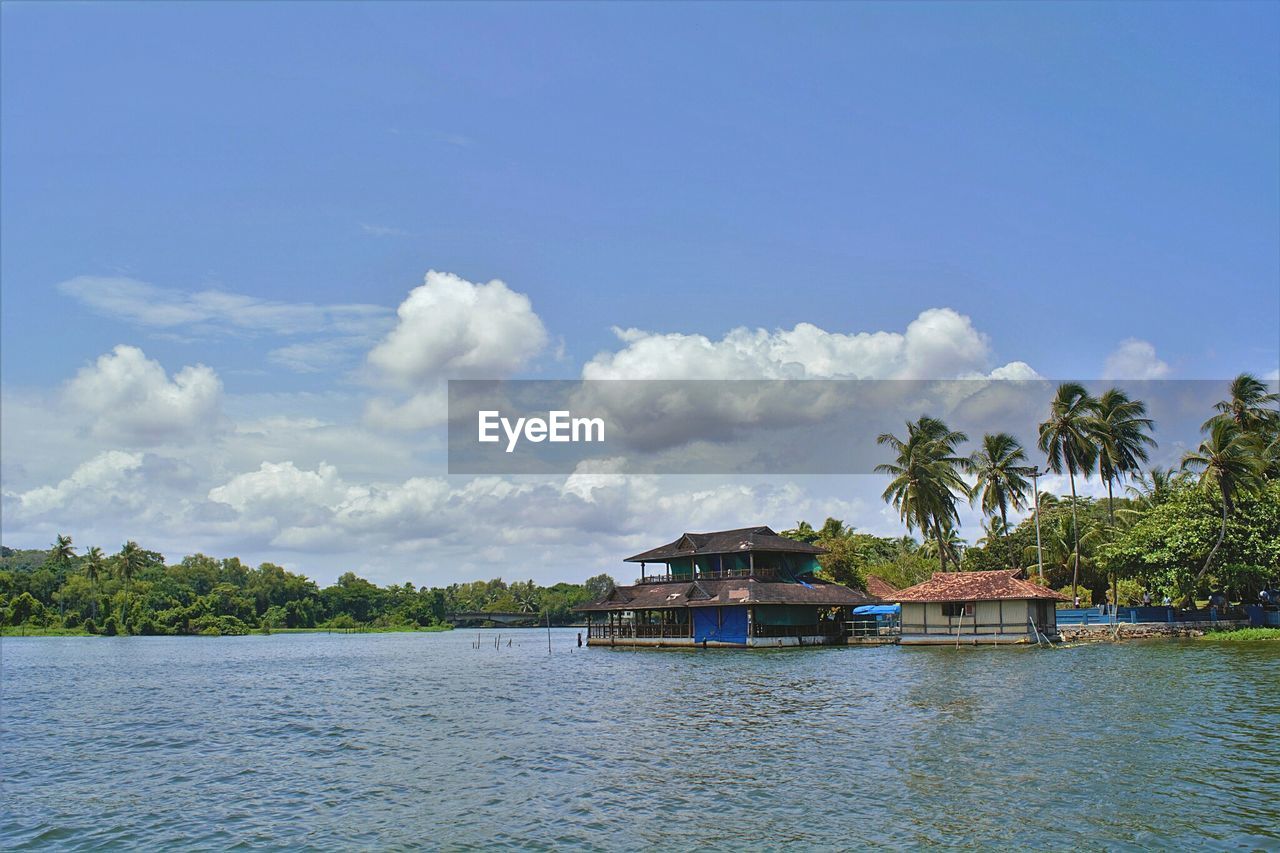 SCENIC VIEW OF CALM SEA AGAINST CLOUDY SKY