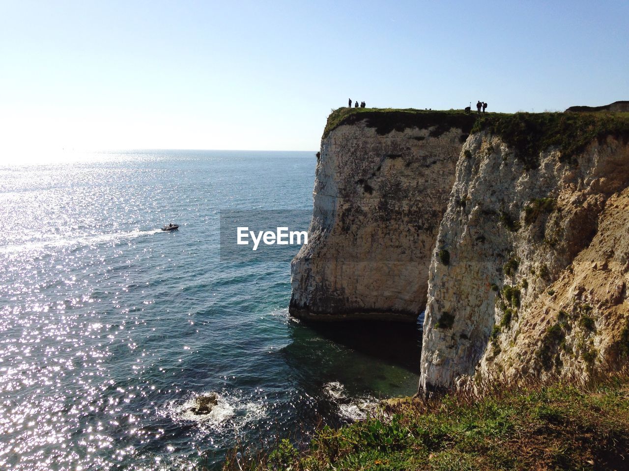 Rocky shore along calm sea