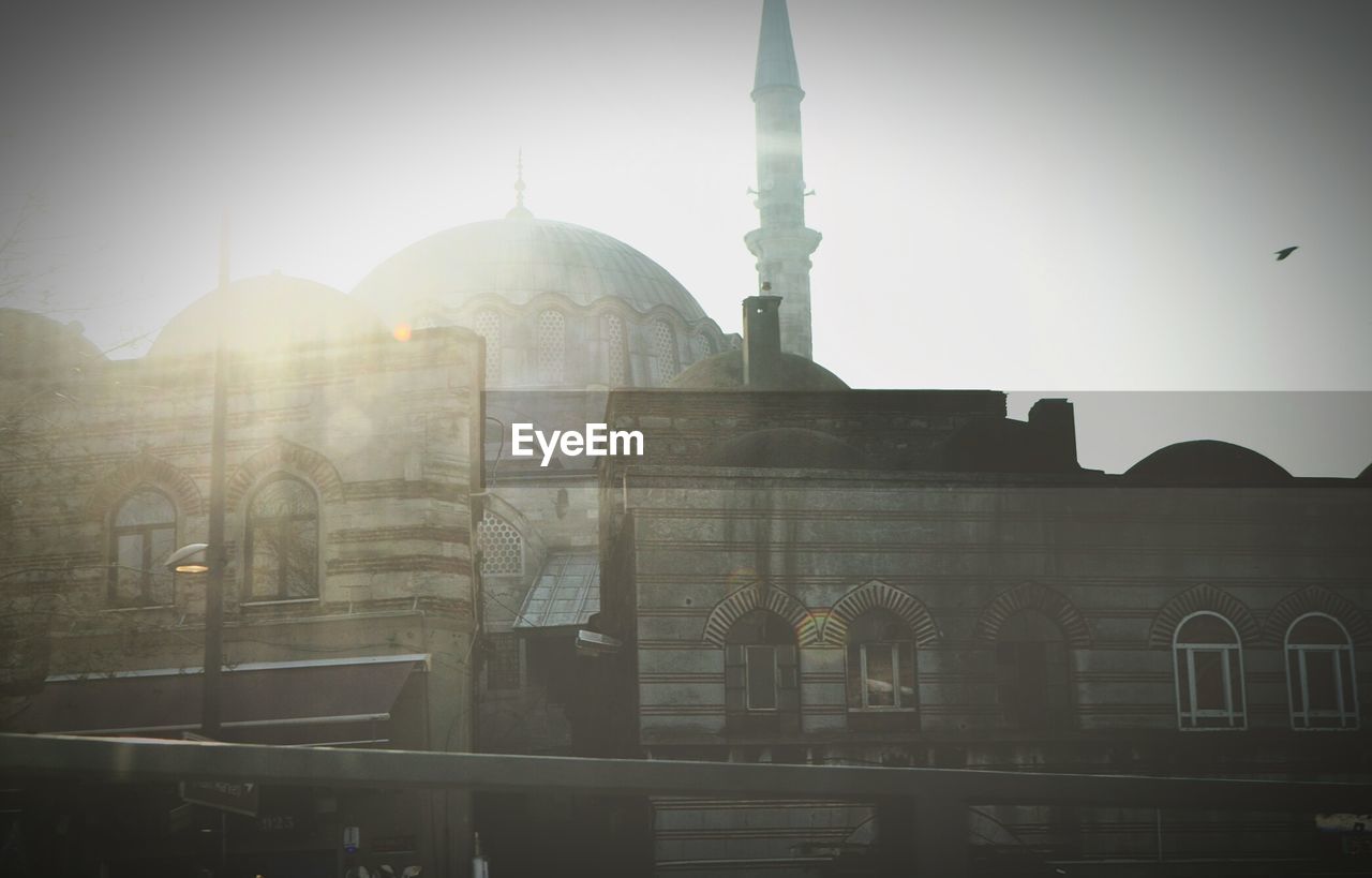 Low angle view of mosque against sky