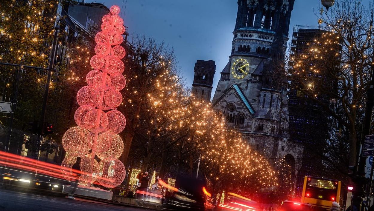 LOW ANGLE VIEW OF ILLUMINATED CITY STREET