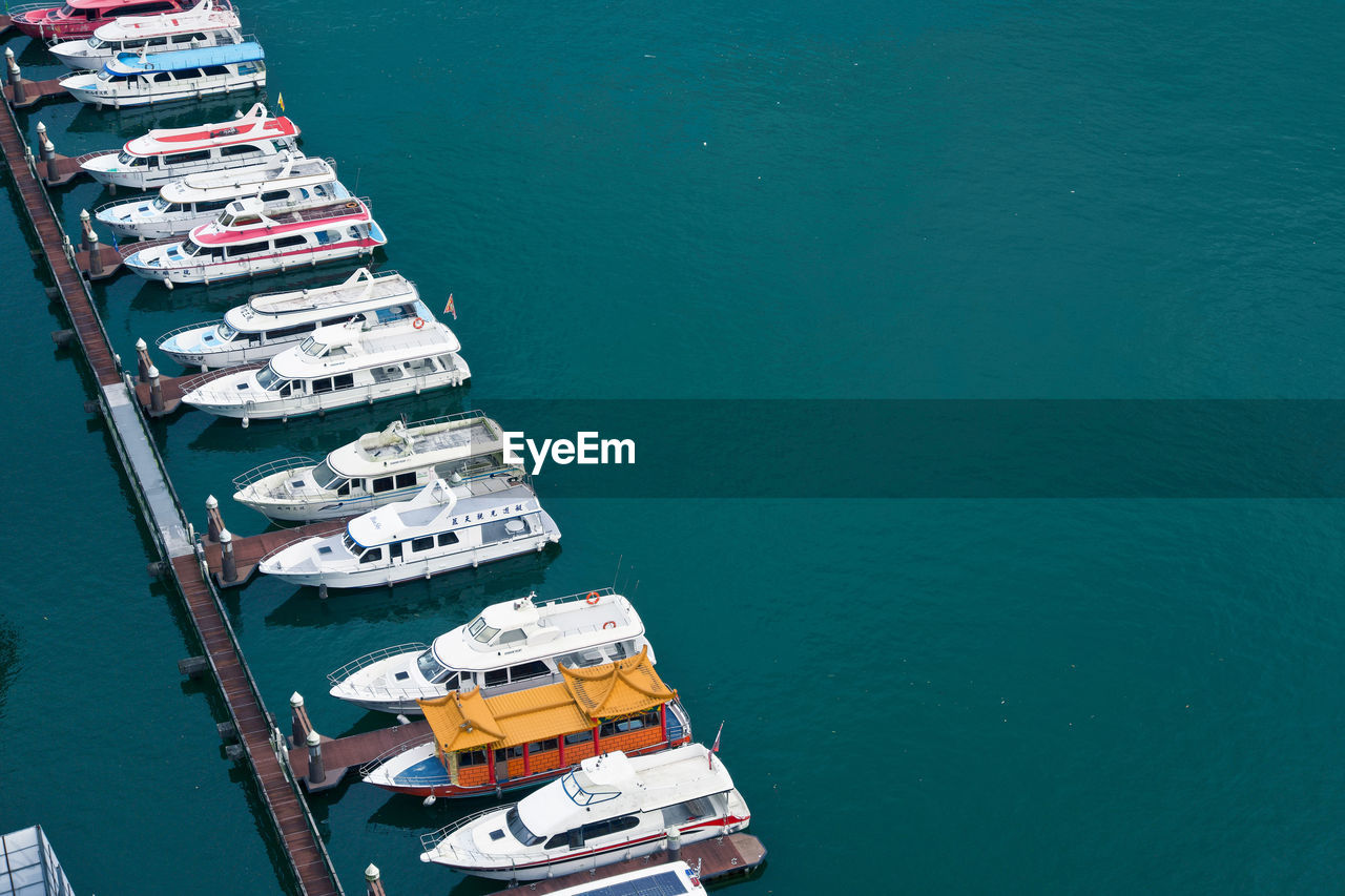 High angle view of ship moored at harbor