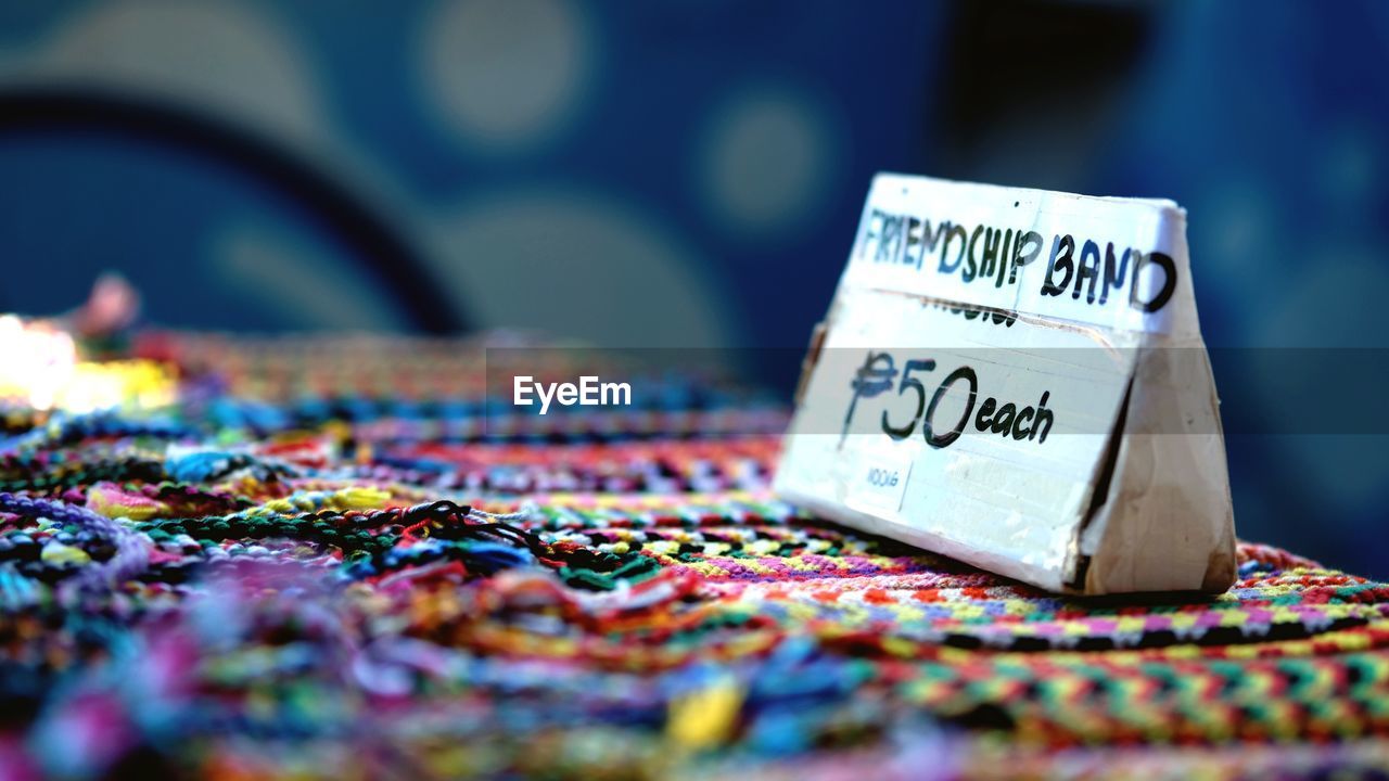 Close-up of price tag at market stall