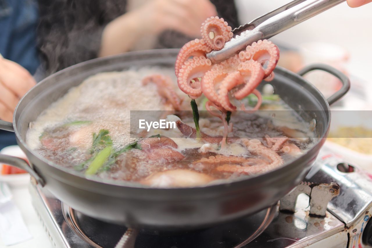 Close-up of seafood in cooking pan