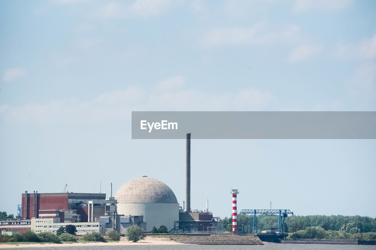 VIEW OF FACTORY AGAINST SKY