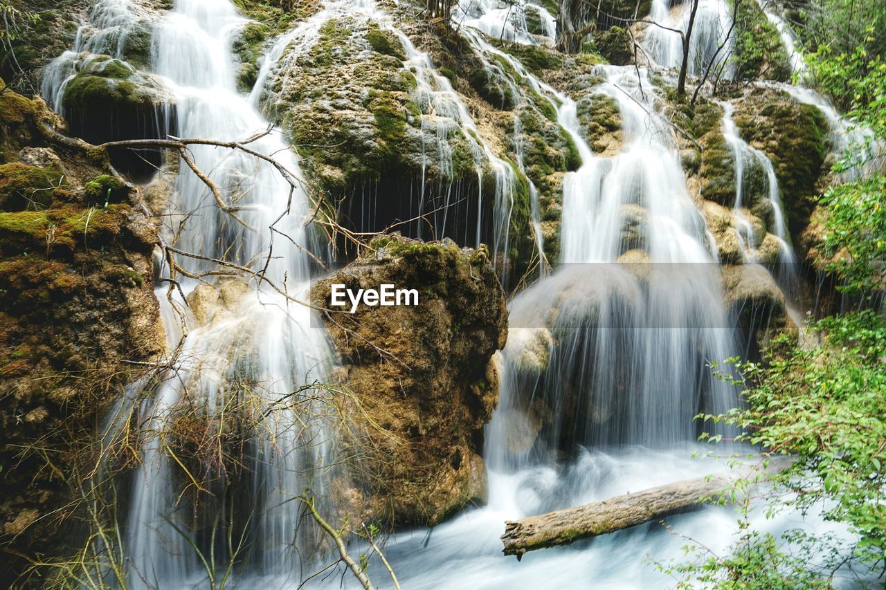 Water falling through rocks at pearl shoal waterfall