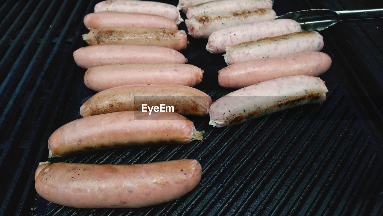 High angle view of meat on barbecue grill