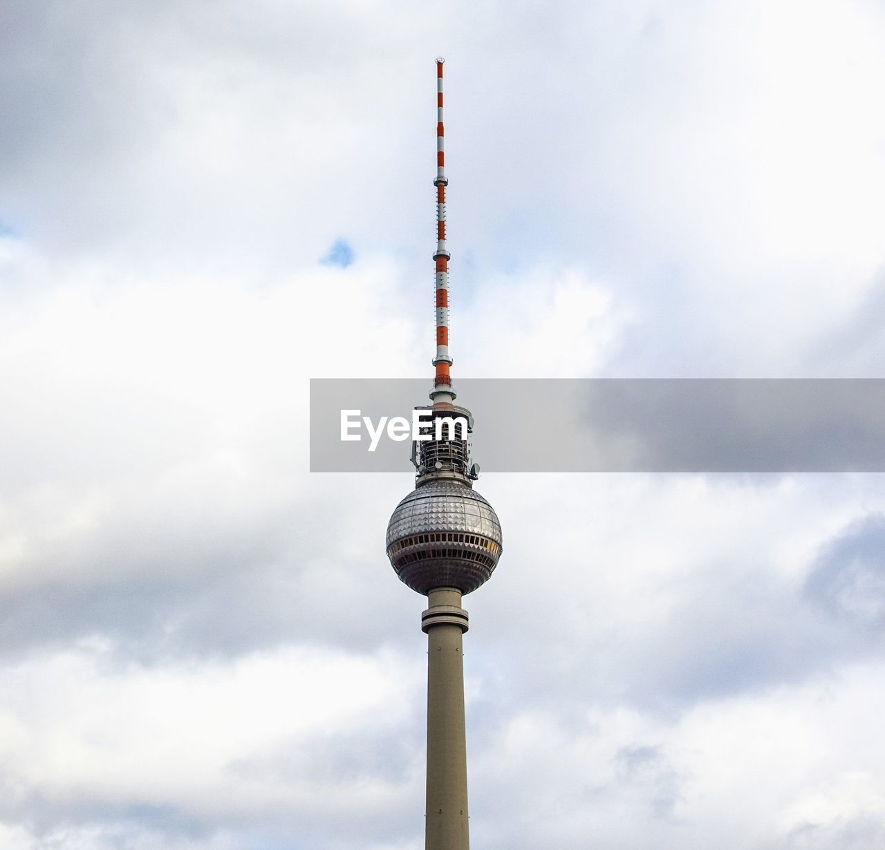 Low angle view of fernsehturm tower against sky