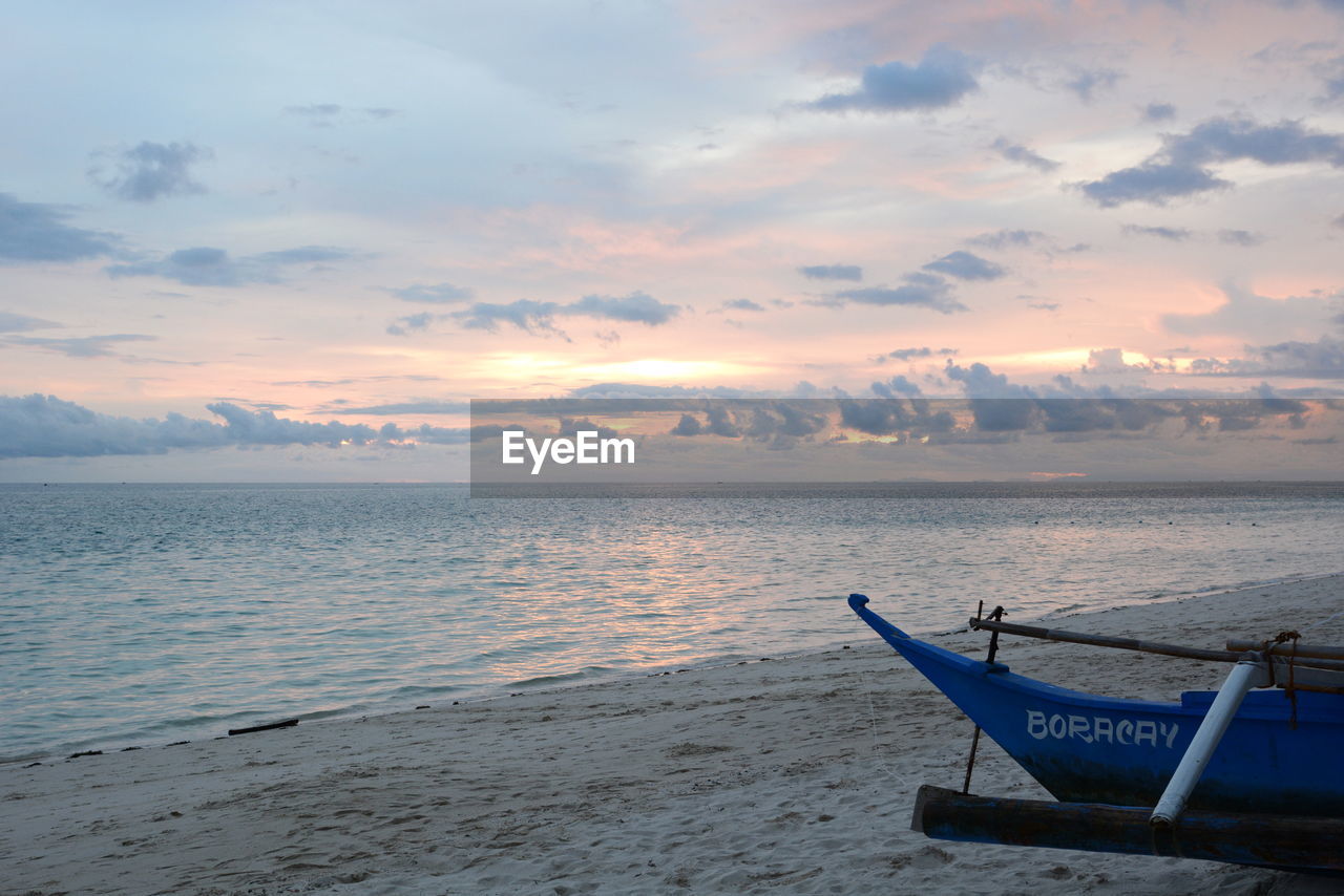 SCENIC VIEW OF SEA DURING SUNSET