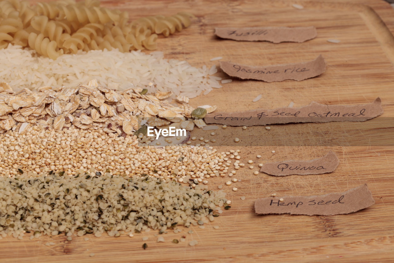 High angle view of food ingredients with labels on table