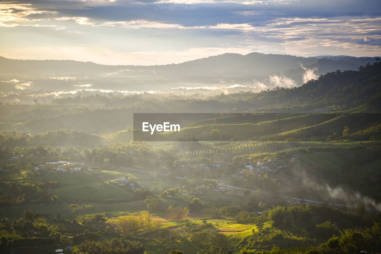 Aerial view of landscape against sky during sunset