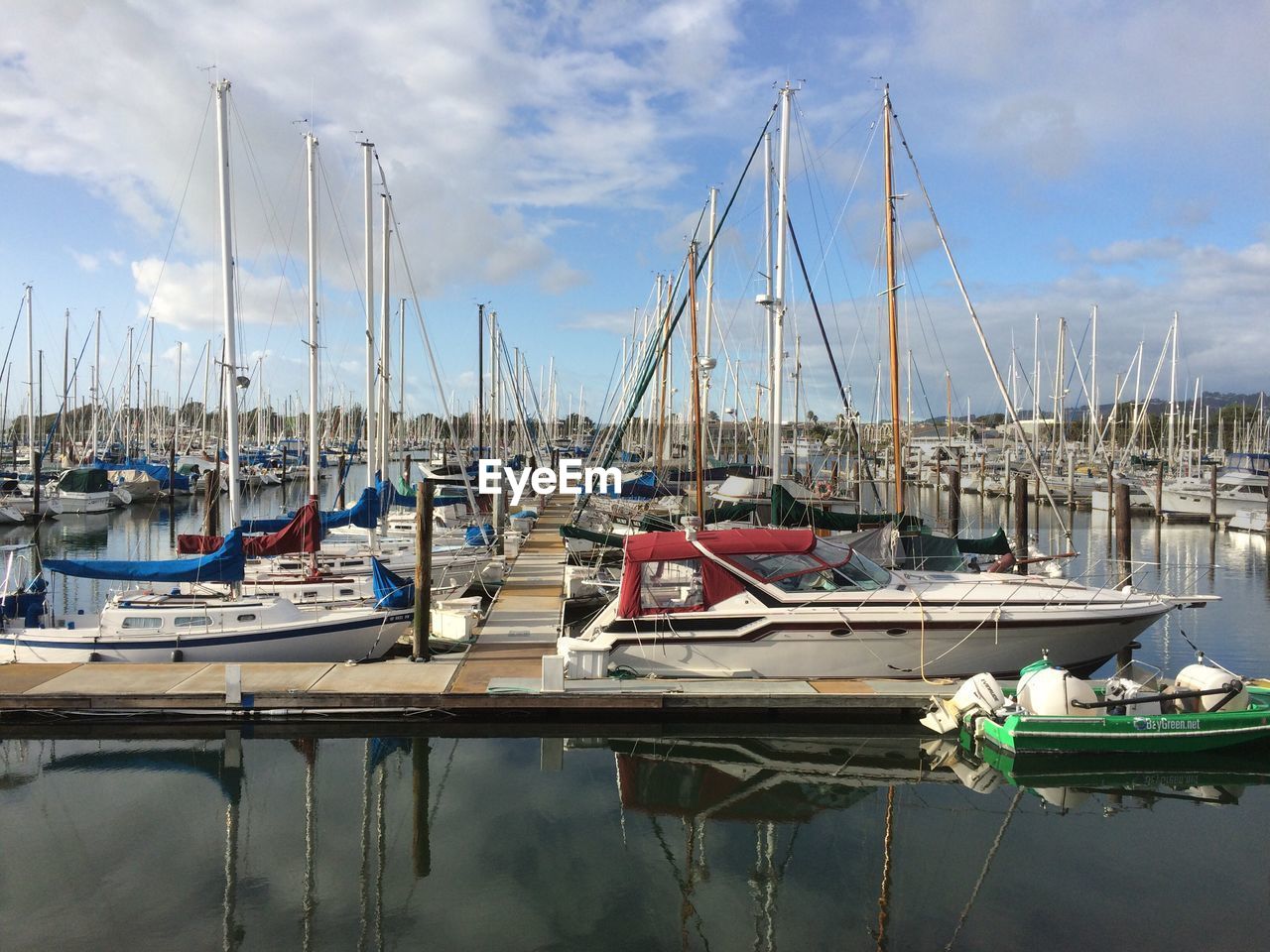 Boats moored at harbor