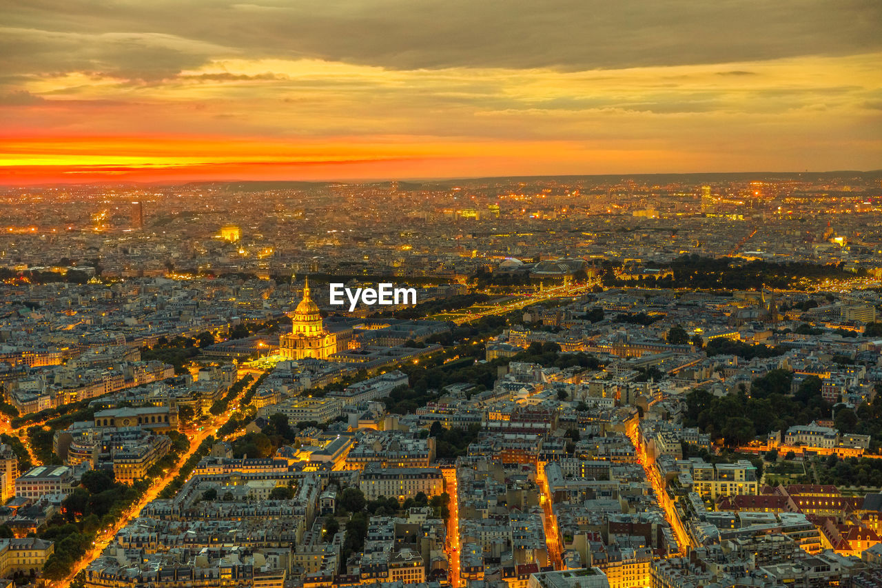 Aerial view of city buildings during sunset