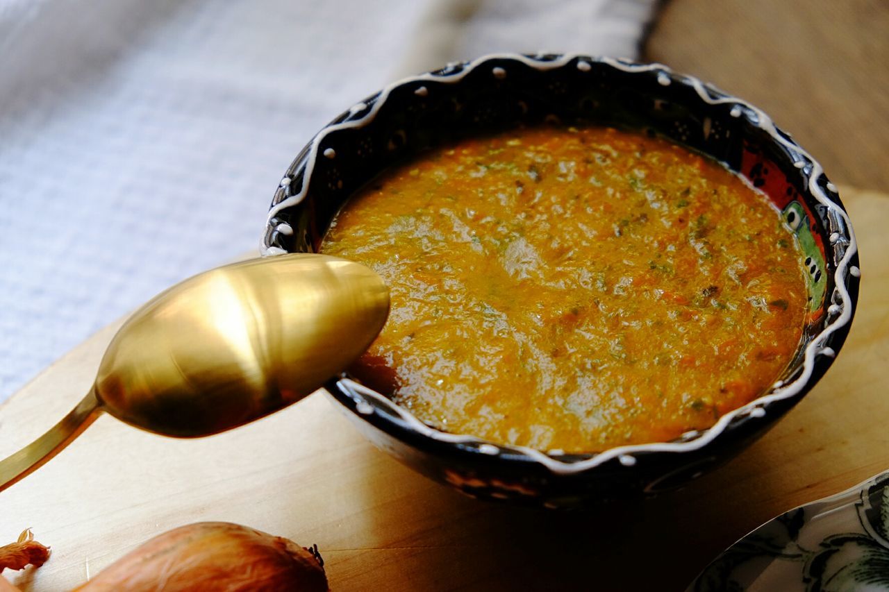 Summer soup. high angle view of soup in bowl on table