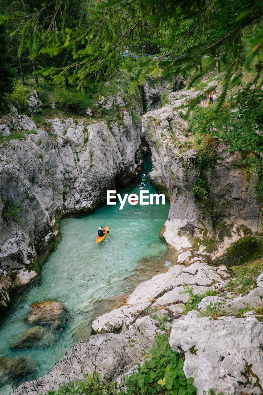 Scenic view of river amidst rocks