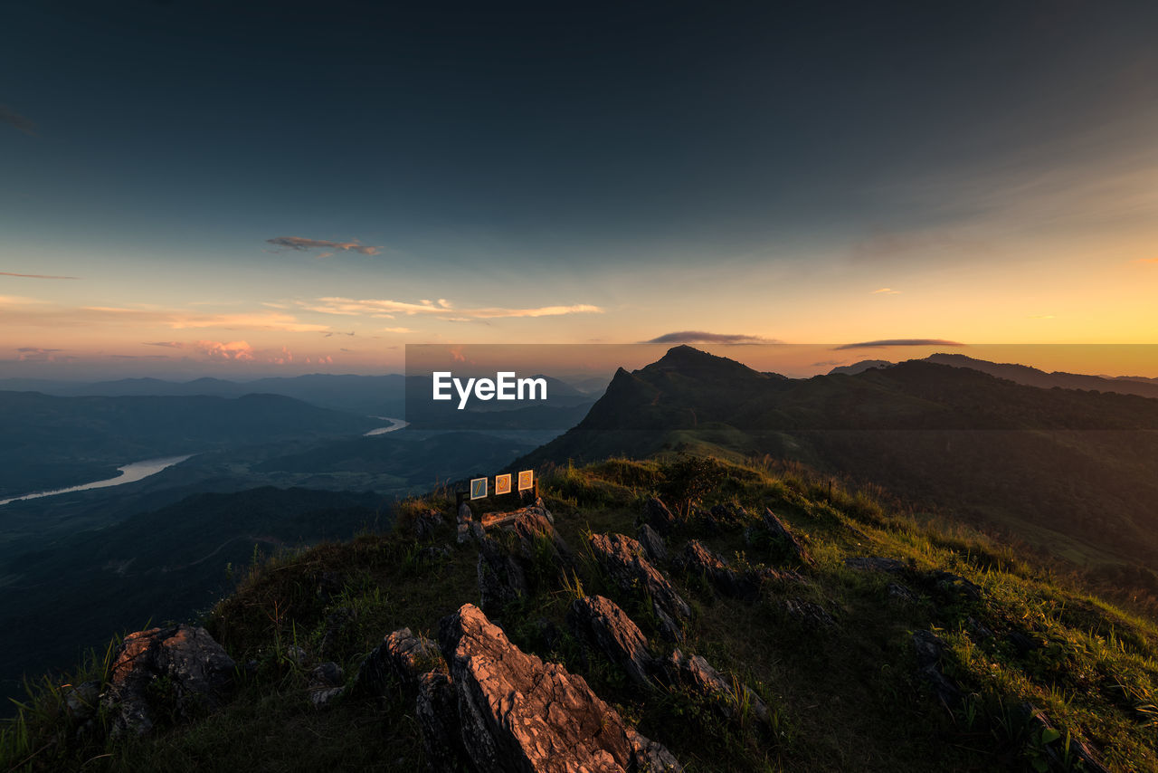 Scenic view of mountains against sky during sunset