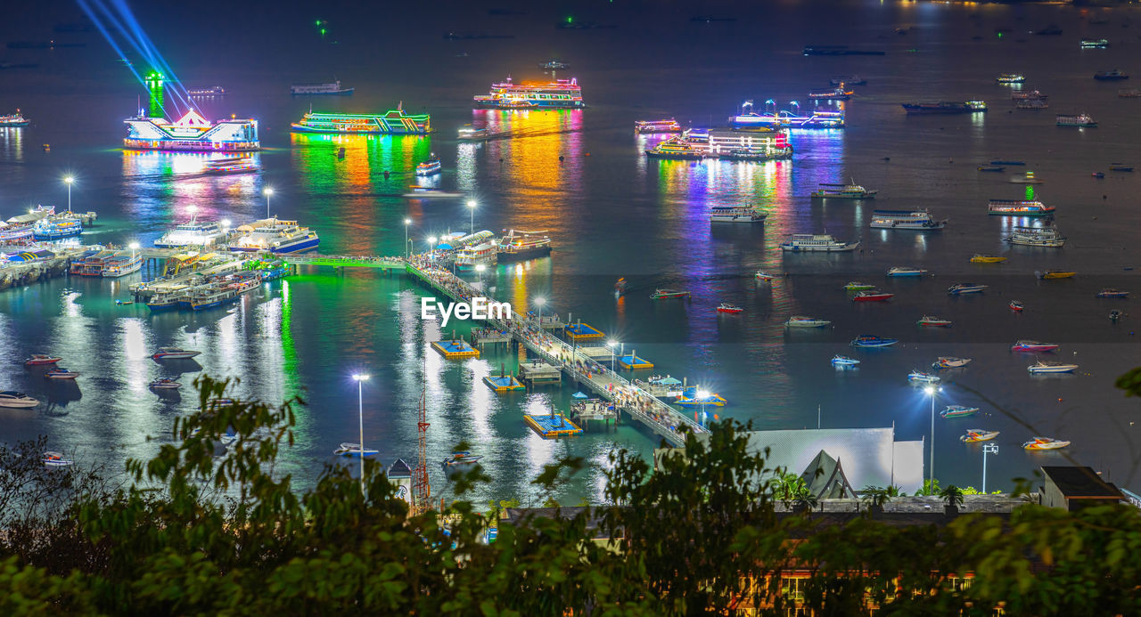 Pattaya port with ferry of thailand on night time