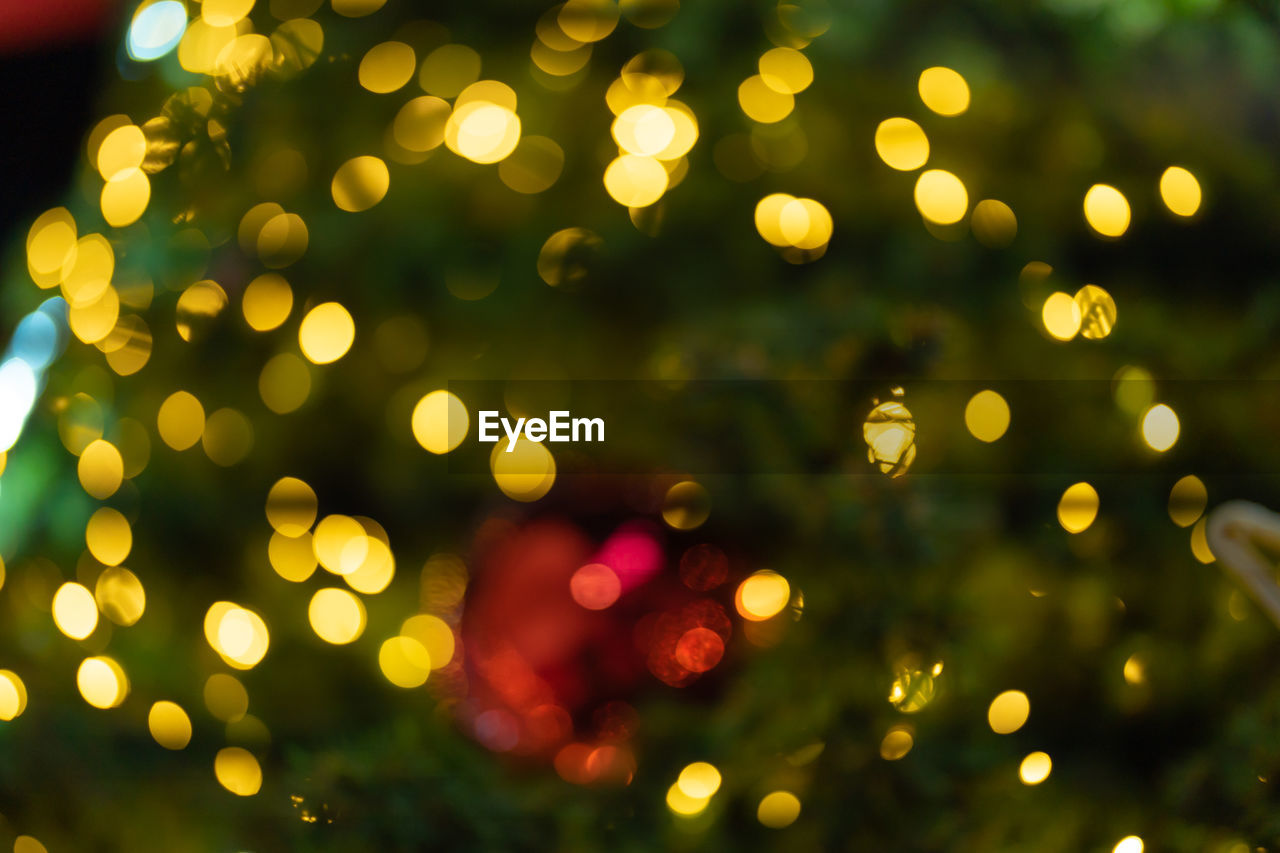 defocused image of illuminated christmas lights