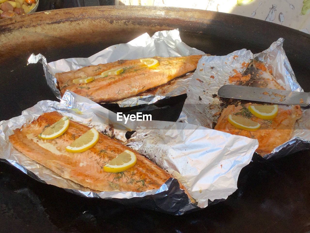 High angle view of seafood on foil