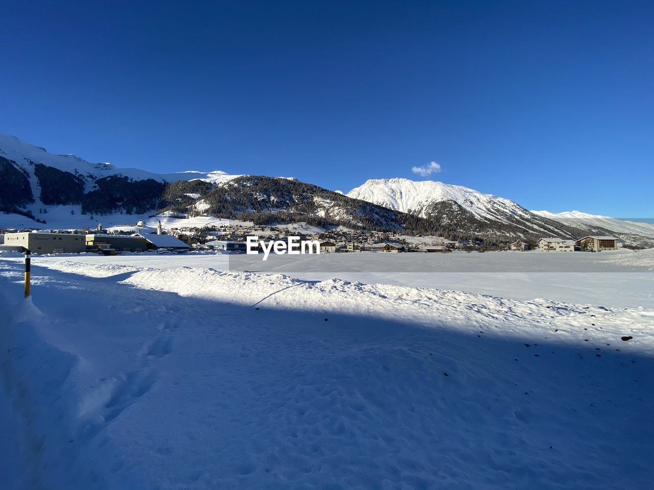 SNOWCAPPED MOUNTAIN AGAINST BLUE SKY