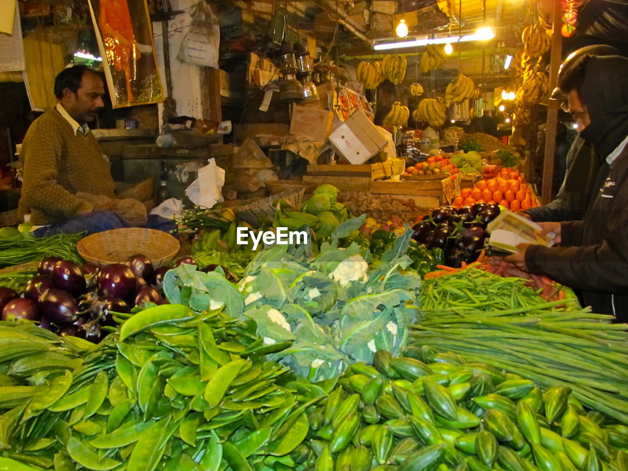 GROUP OF PEOPLE IN MARKET