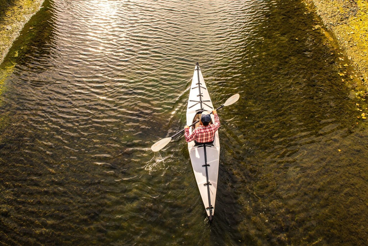 High angle view of man boating on river
