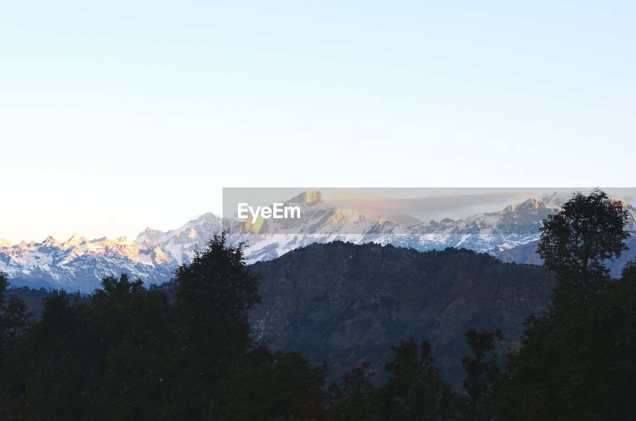 SCENIC VIEW OF SNOWCAPPED MOUNTAINS