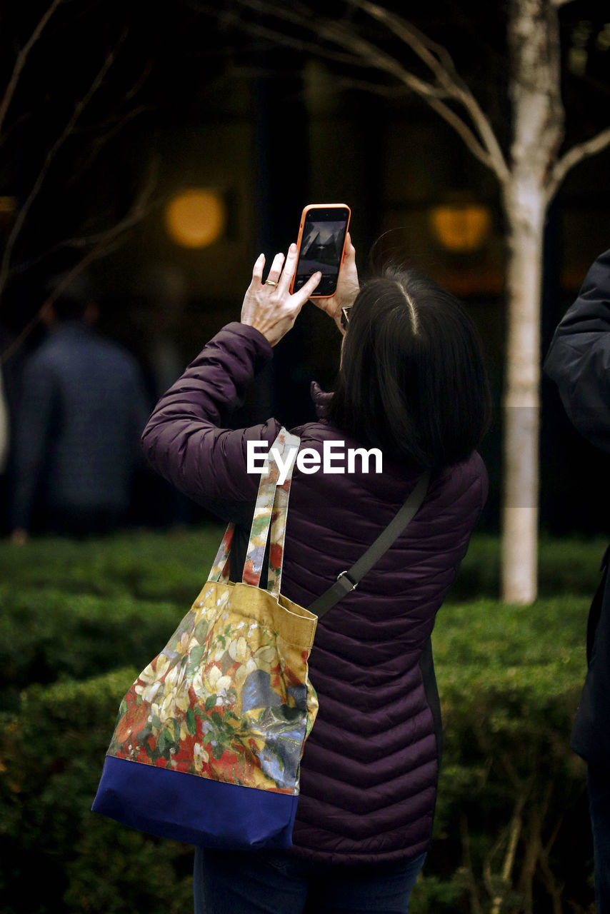 Woman using mobile phone