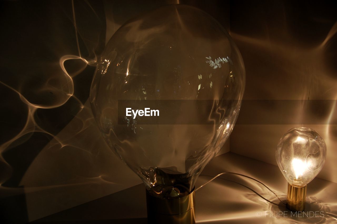 LOW ANGLE VIEW OF ILLUMINATED ELECTRIC LIGHT