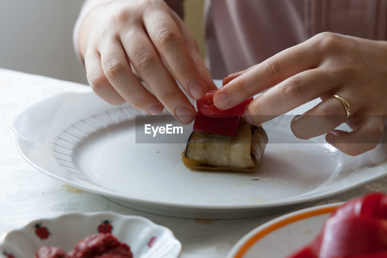 Close-up of woman preparing food