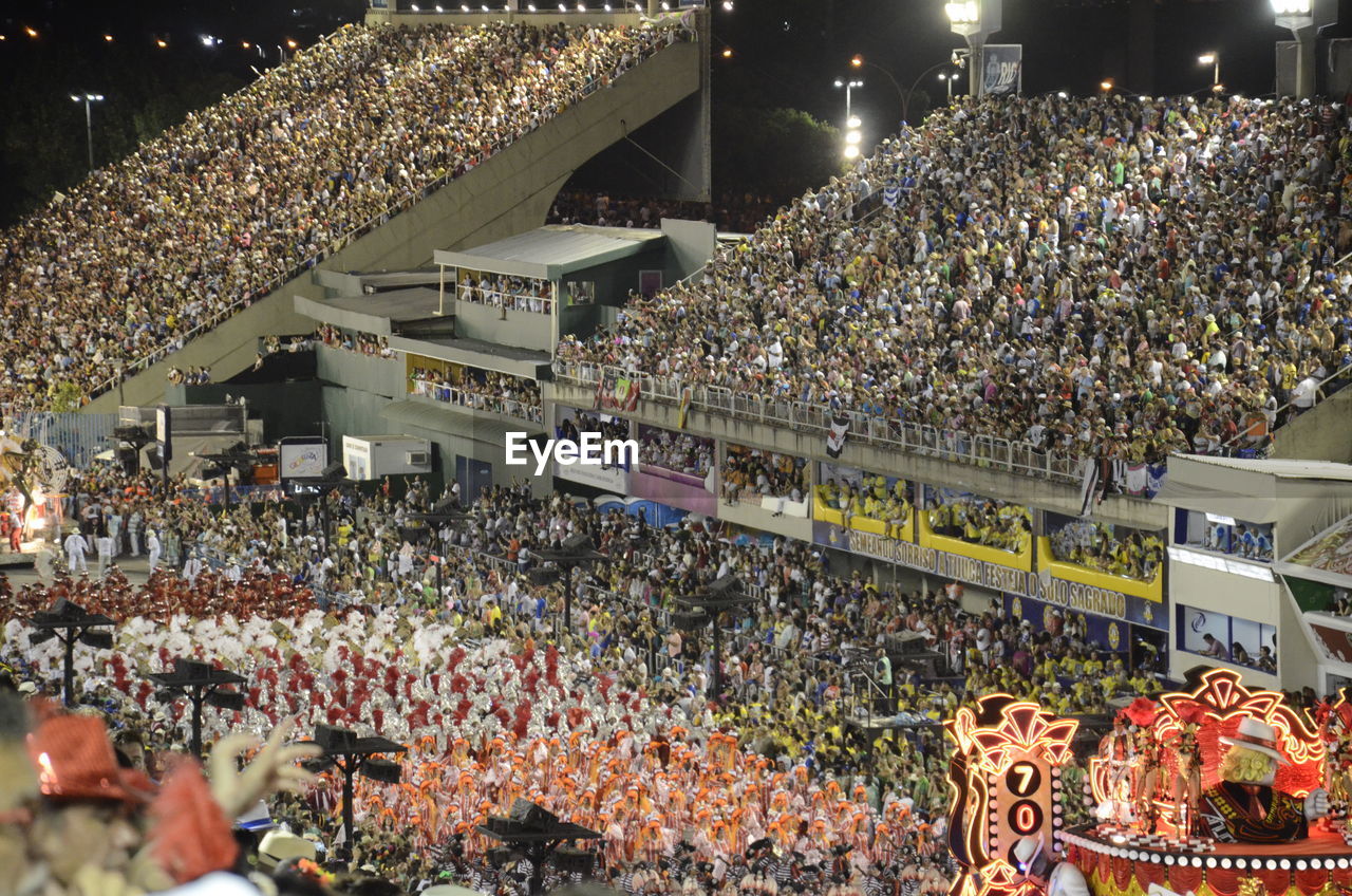 Crowd in stadium at night