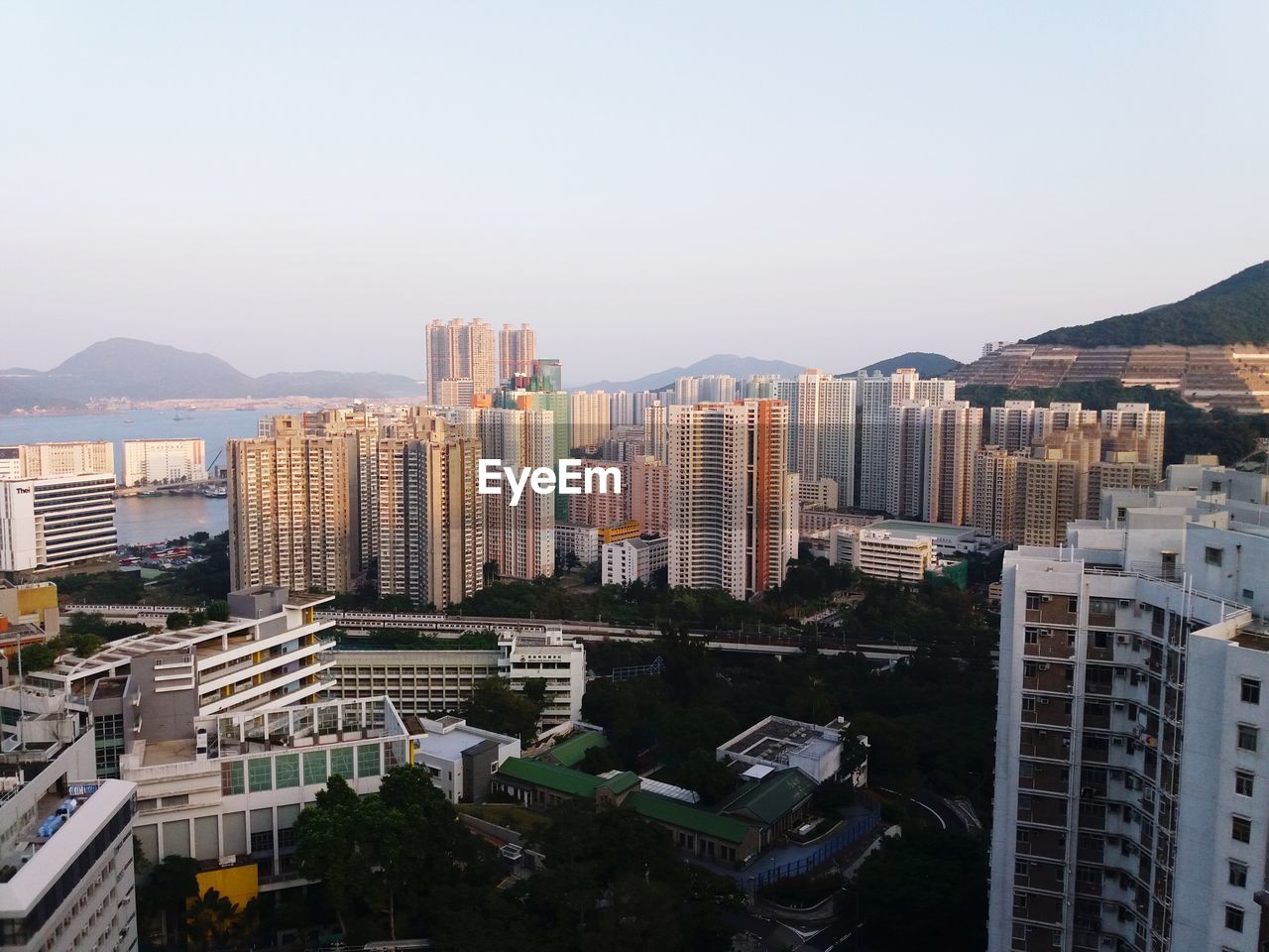 High angle view of buildings in city against clear sky