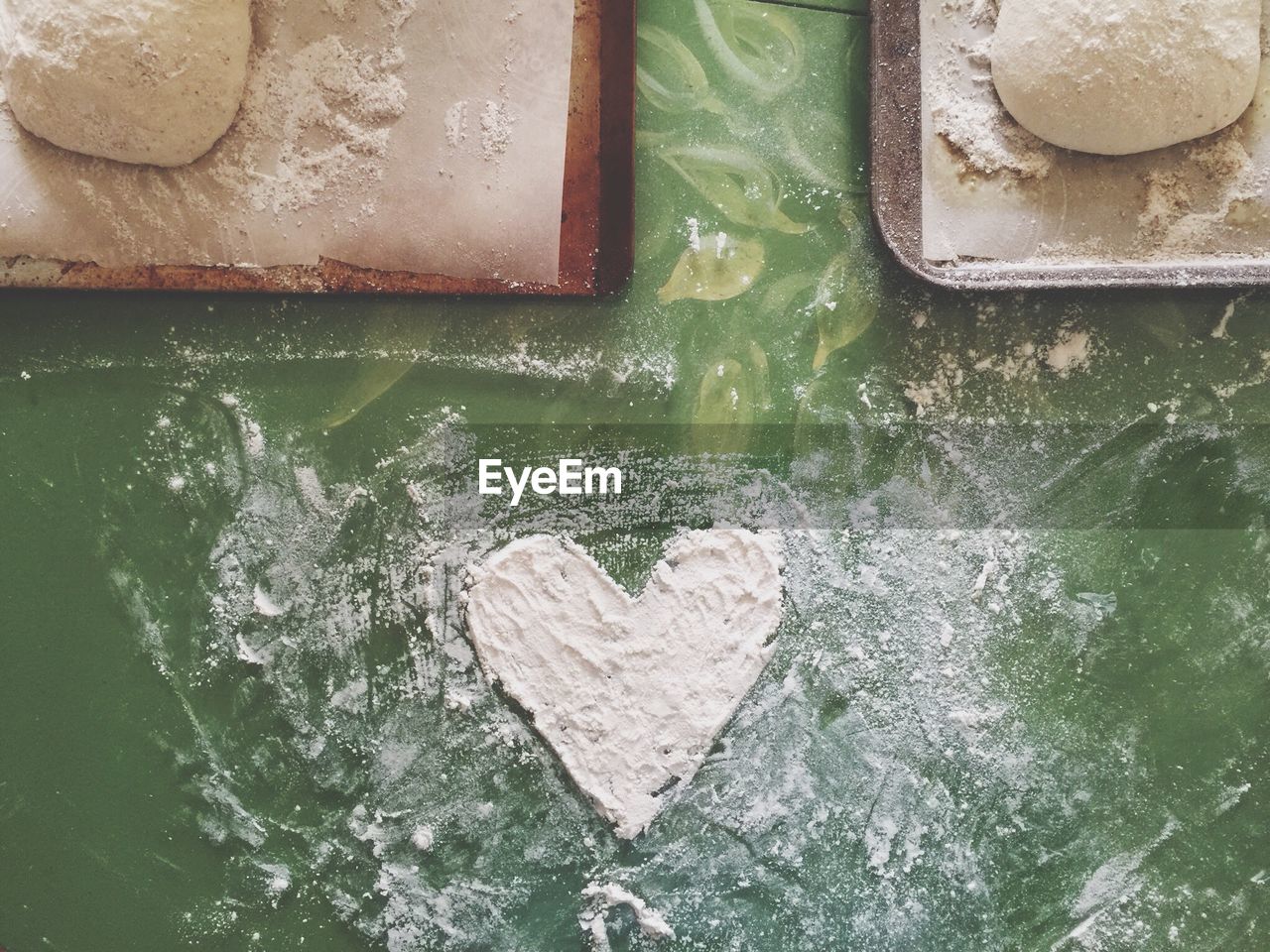 Directly above shot of heart shape bread dough
