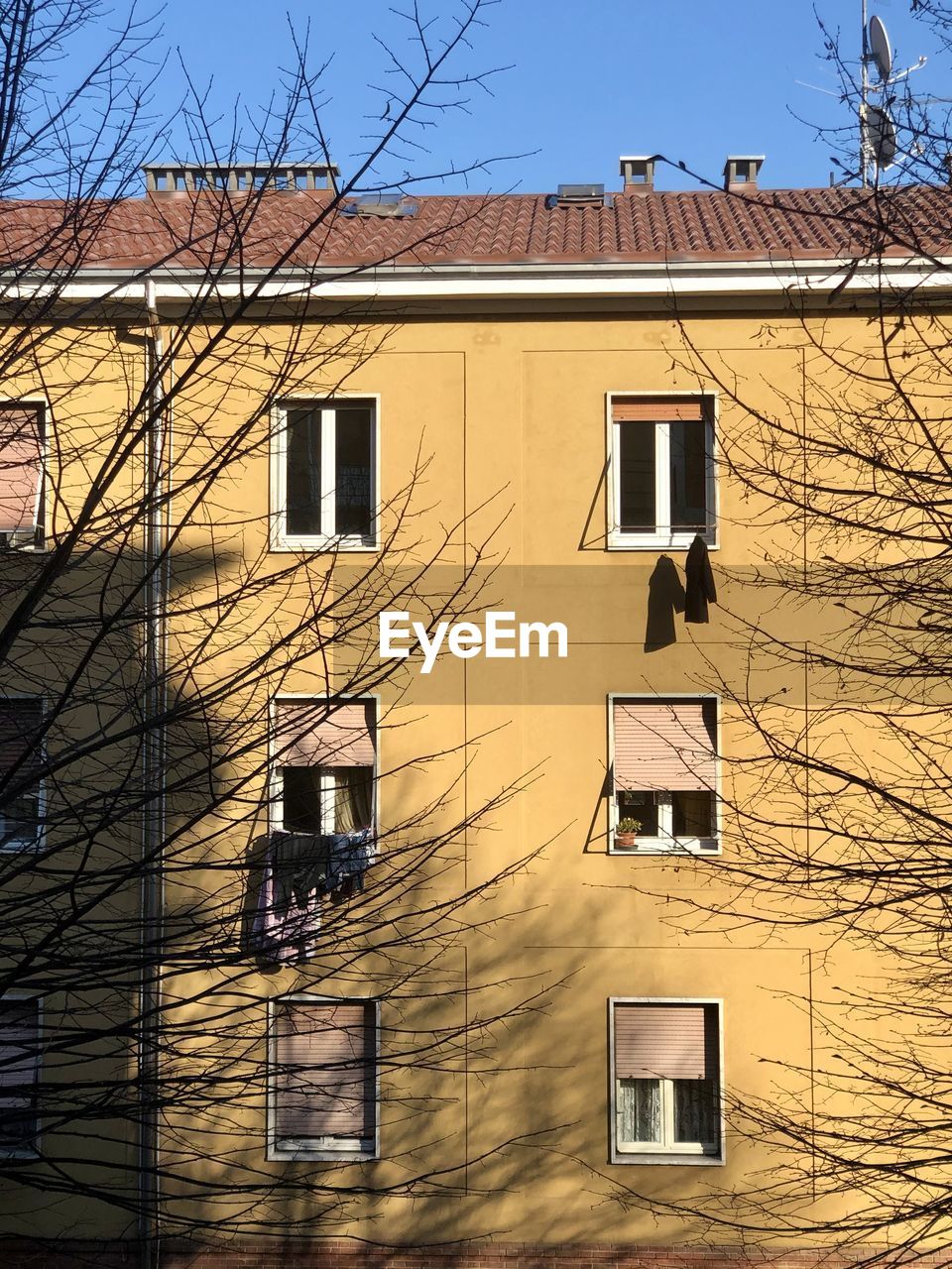 Residential building windows against sky