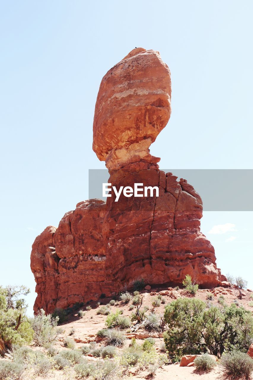 LOW ANGLE VIEW OF ROCK FORMATION