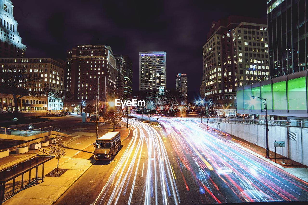 Traffic light trails on road at night