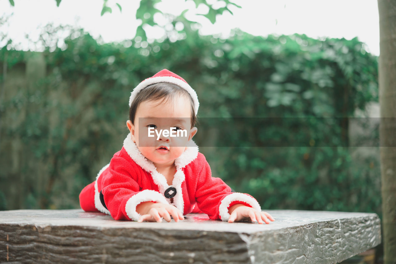 PORTRAIT OF CUTE GIRL LOOKING AWAY