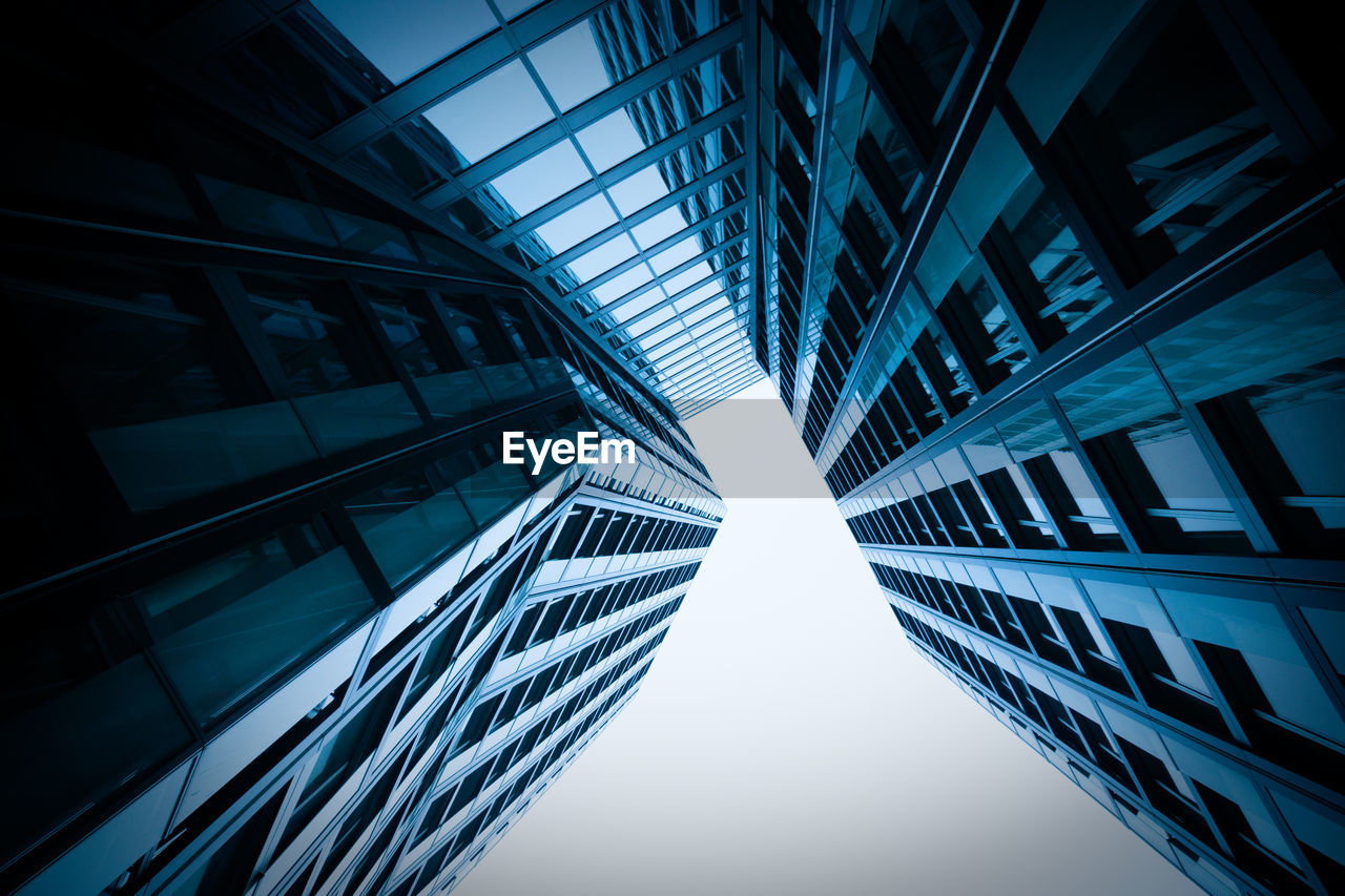 Low angle view of modern buildings against clear sky