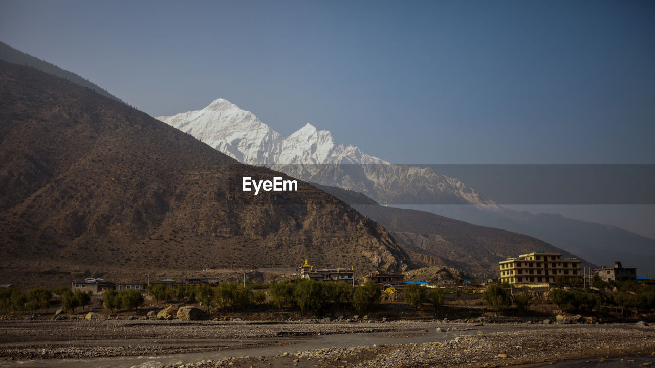 Scenic view of mountains against clear sky