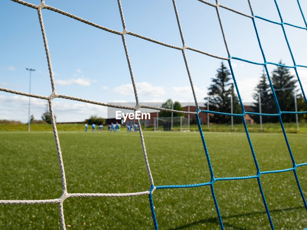 Soccer field in the bright light of summer day. prepared playground for finnal match